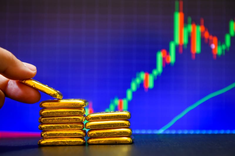 gold bars with price chart