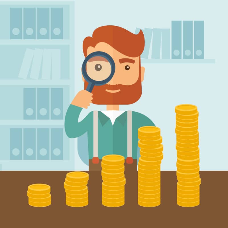 inspecting gold coins