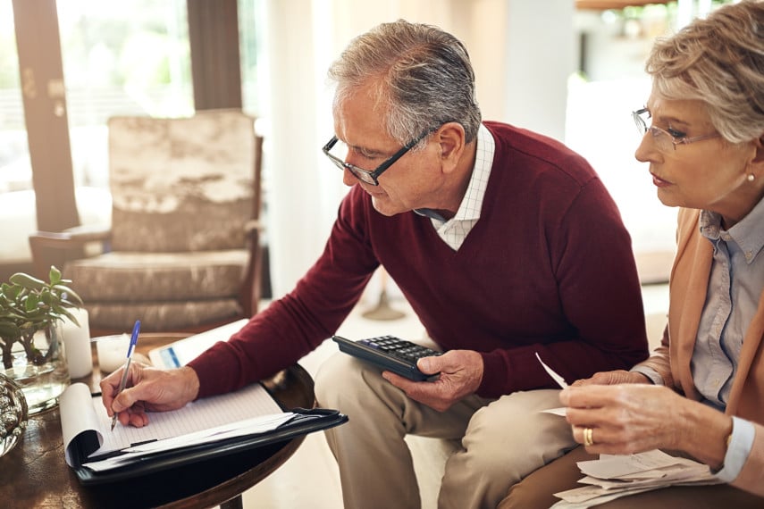 retired couple going over retirement accounts