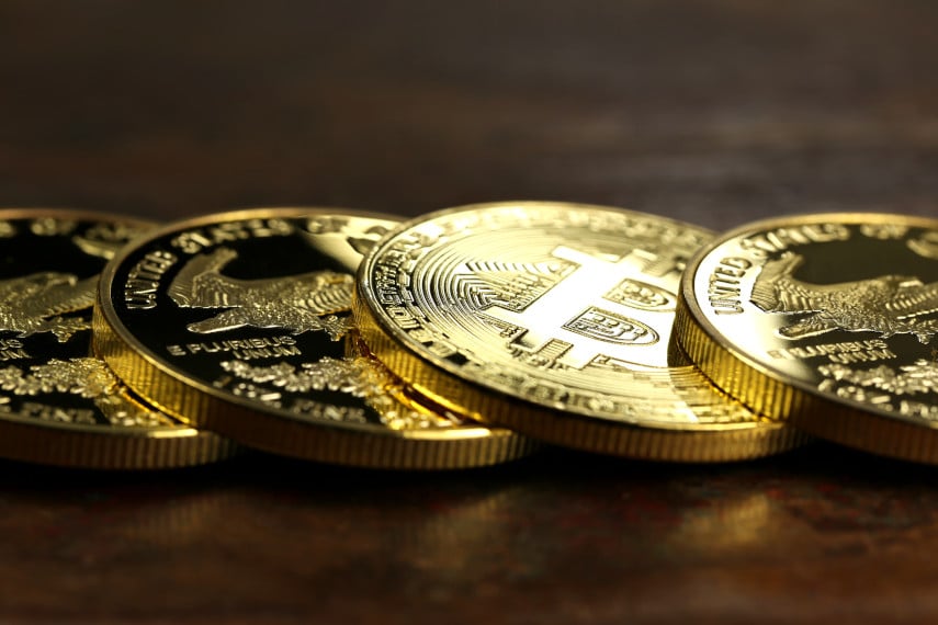 gold coins with Bitcoin coin