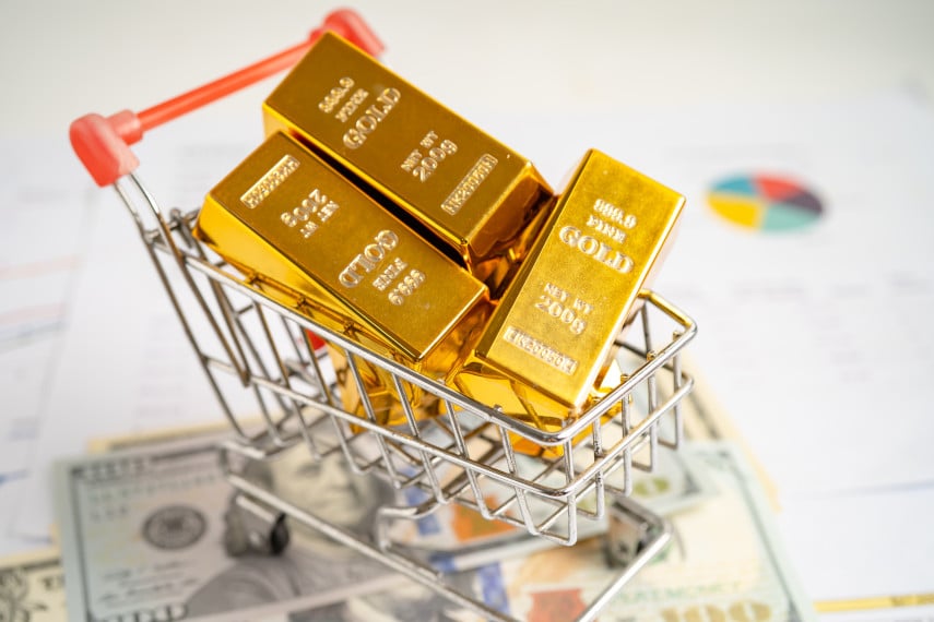 gold bars in a shopping cart