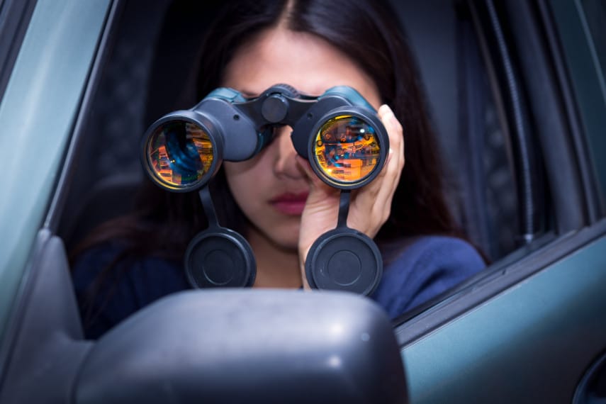 lady watching with binoculars