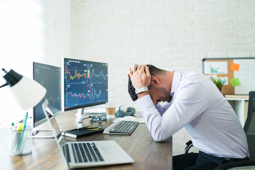 worried banker at his desk