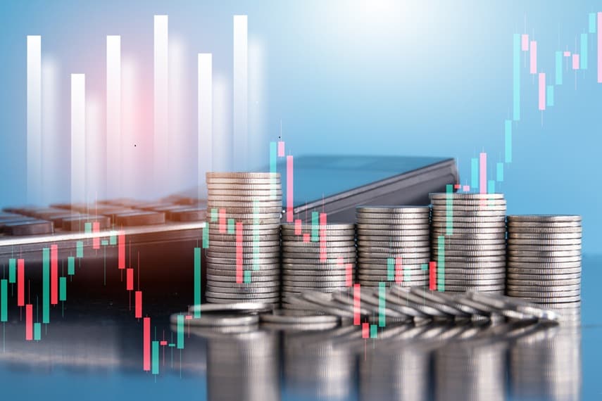 Coin stack with stock market graph, business and finance concept idea.